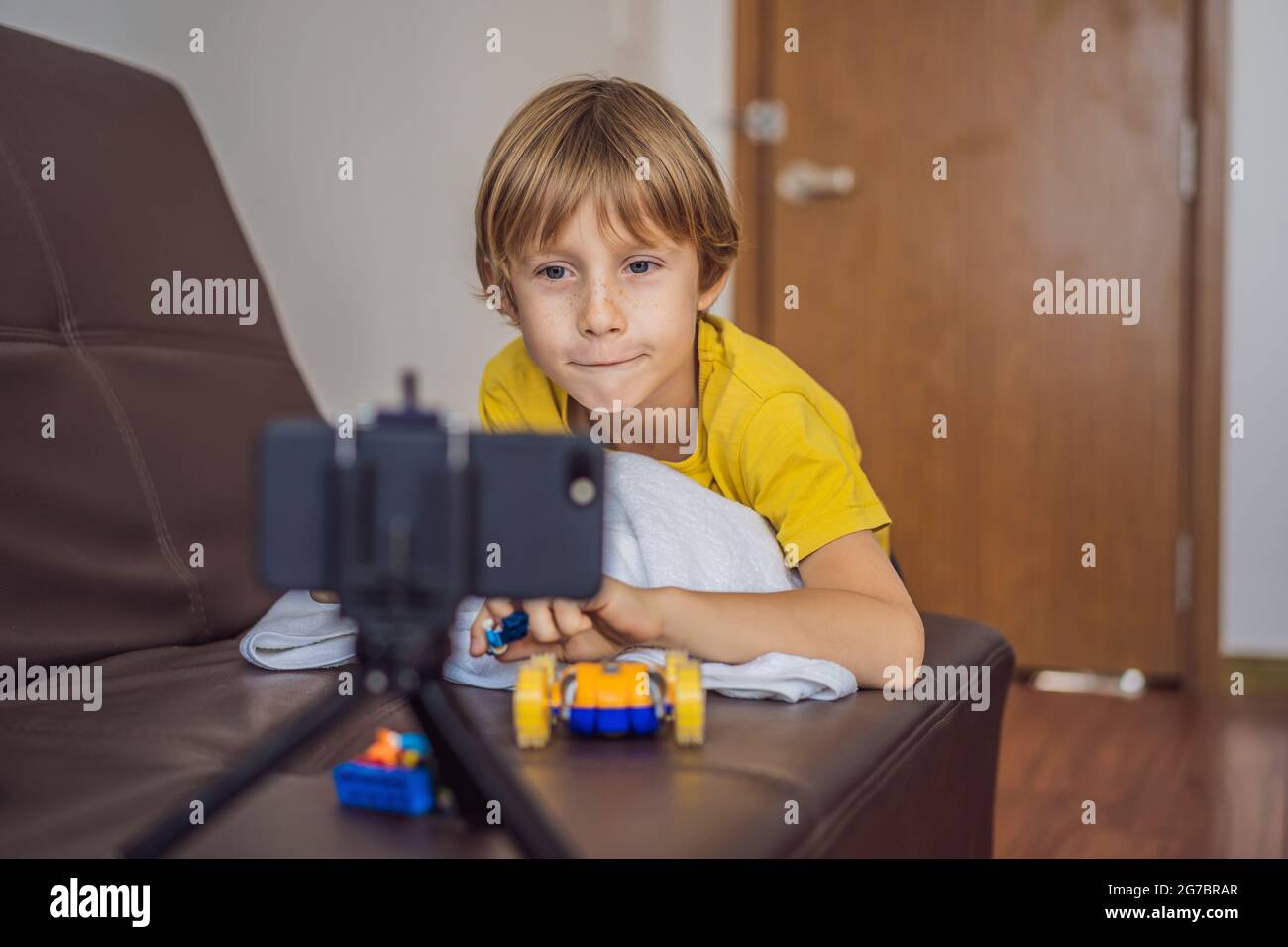 Smiling African Boy Playing Online Games in Class Stock Photo - Image of  phone, modern: 177228872