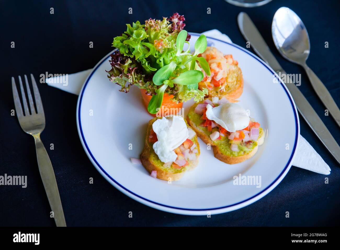 hors d'oeuvres served in white dish at dinner Stock Photo Alamy