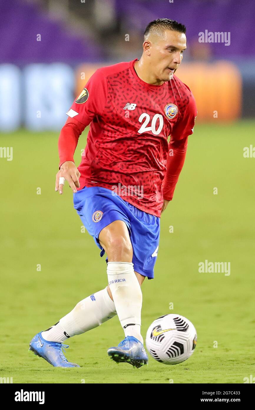 Orlando, Florida, USA. July 12, 2021: Costa Rica midfielder DAVID GUZMAN (20) sets up a play during the 2021 Concacaf Gold Cup Costa Rica vs Guadeloupe soccer match at Exploria Stadium in Orlando, Fl on July 12, 2021. Credit: Cory Knowlton/ZUMA Wire/Alamy Live News Stock Photo