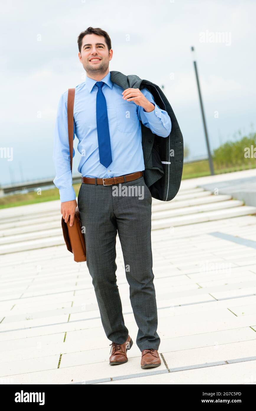 Handsome businessman or manager in leisure time going home Stock Photo