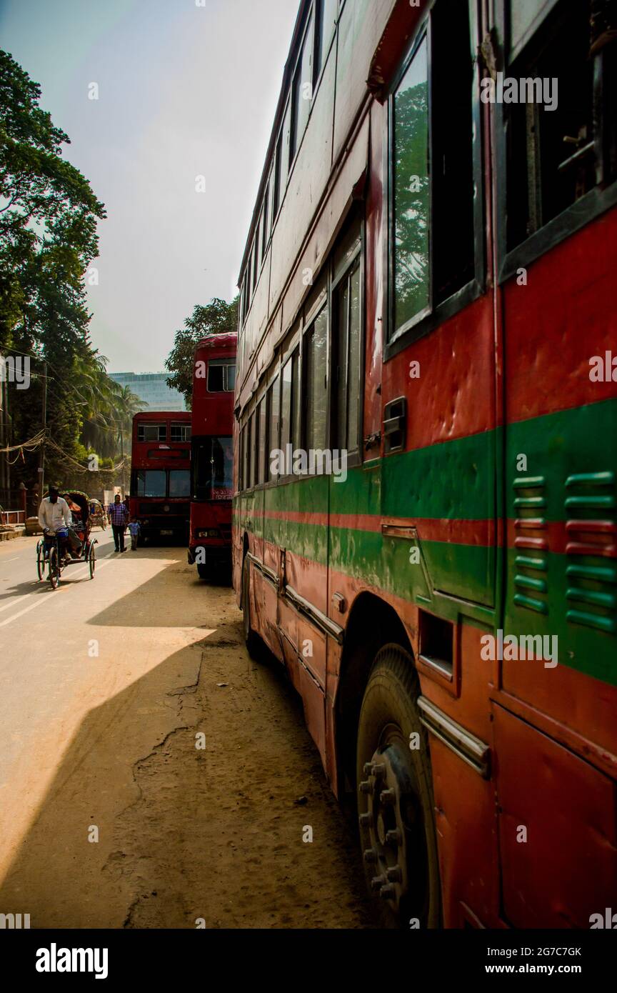 Red Busses of Dhaka University Stock Photo