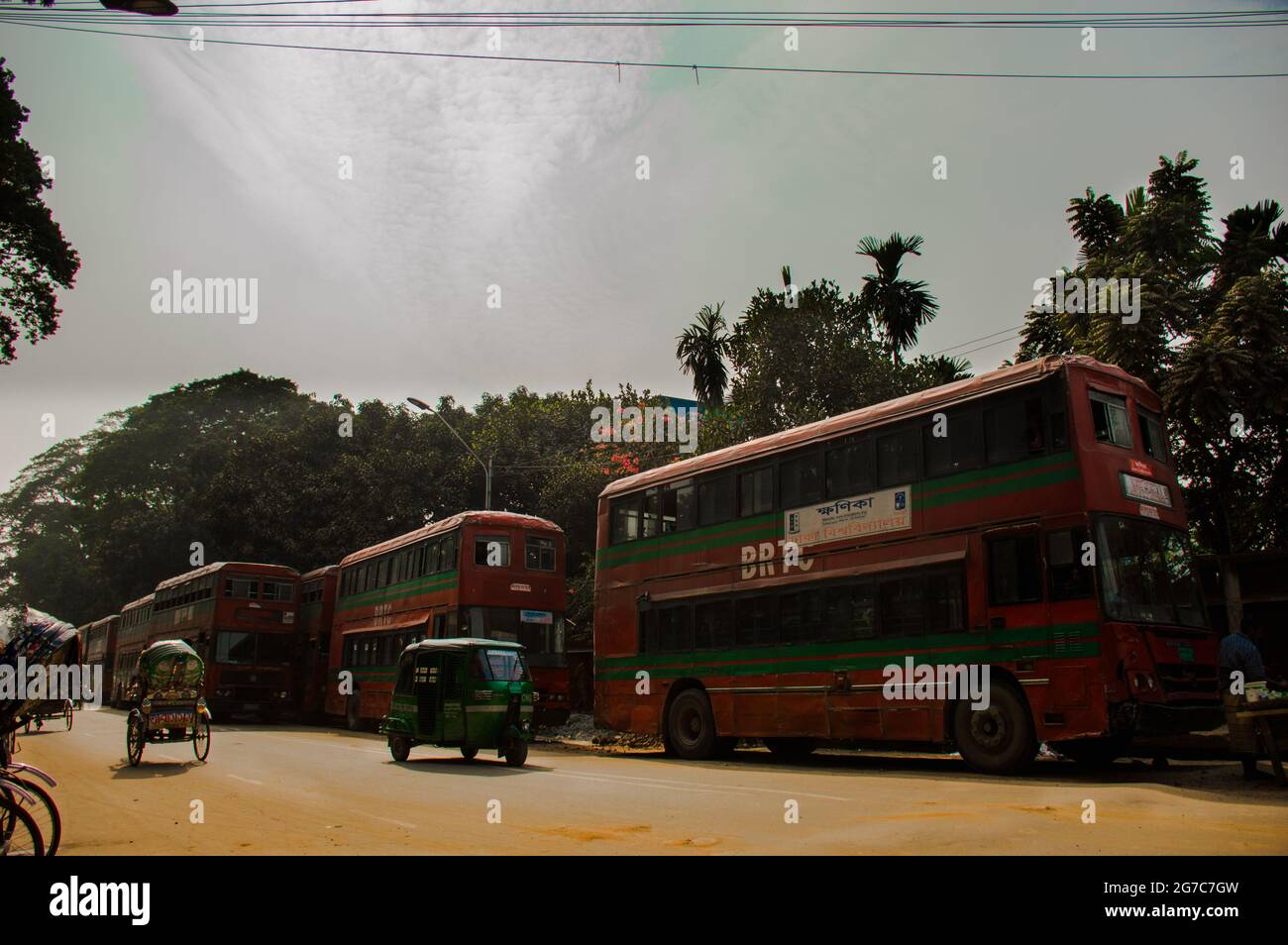 Red busses of dhaka university Stock Photo