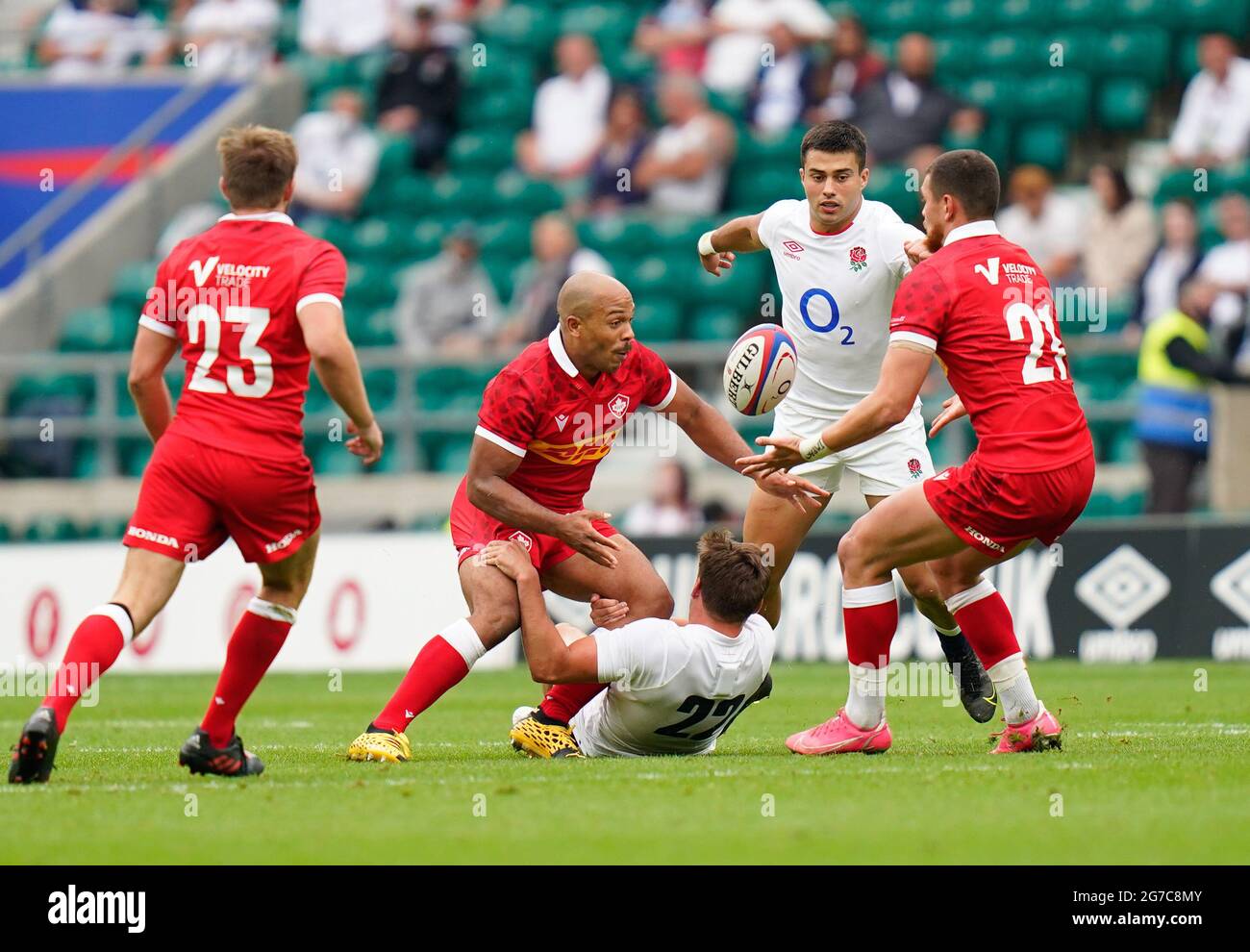 Rugby Canada wing Cole Davis passes to Quinn Ngawati during the England -V- Rugby Canada match on Saturday, July 10, 2021, at Twickenham Stadium, Midd Stock Photo