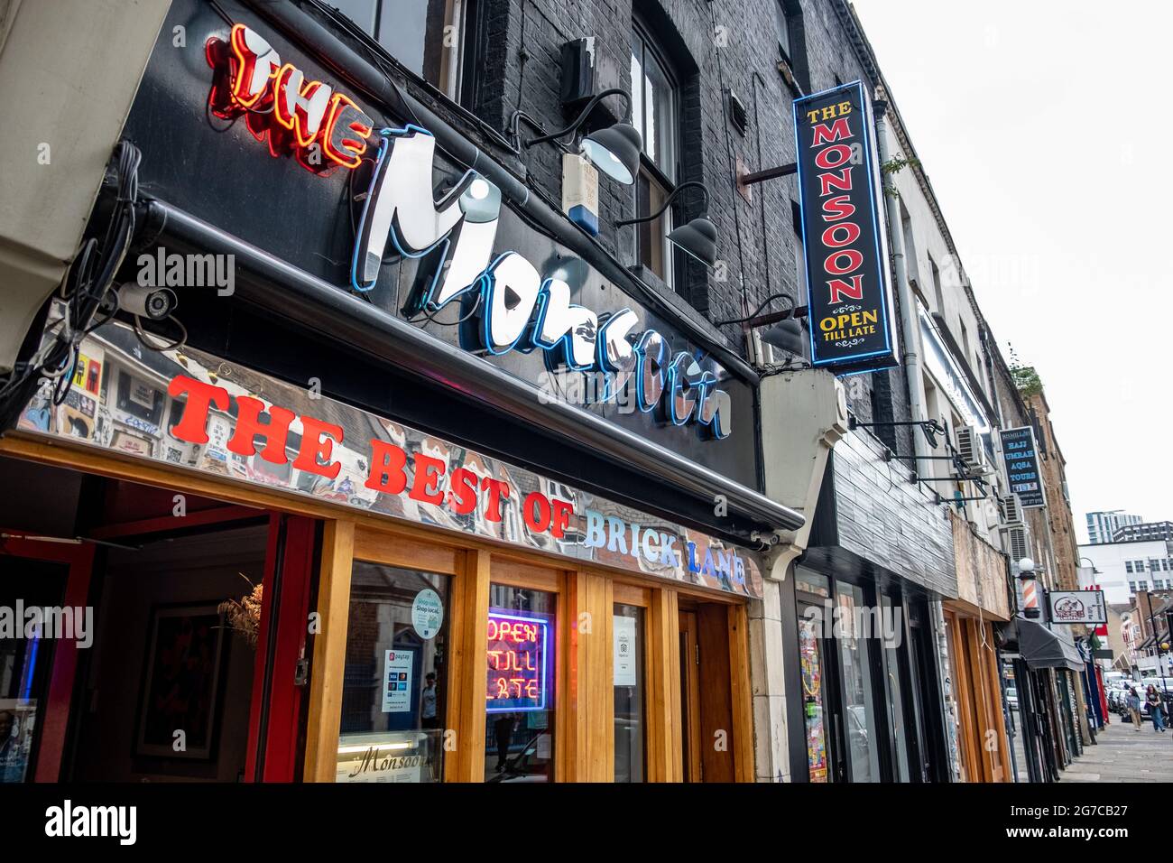 London- July, 2021: The Monsoon, one of many south Asian restaurants on Brick Lane in East London Stock Photo