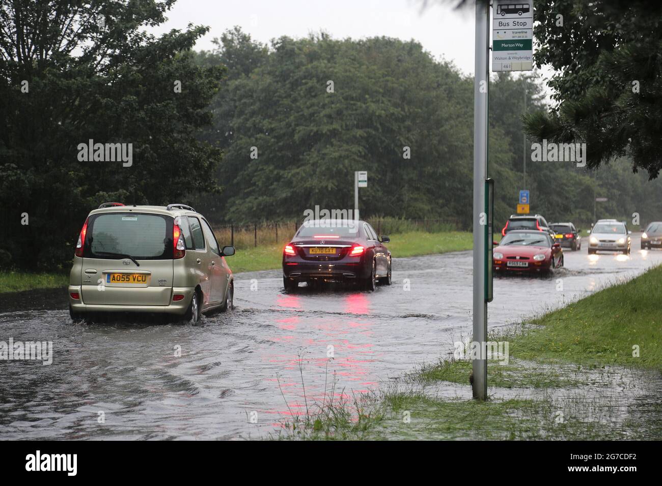 12th July 2021. Flash floods after heavy rain cause road chaos on A3050. Hurst Road, East Molesey, Surrey, England, UK. Credit: Ian Bottle/Alamy Live News Stock Photo