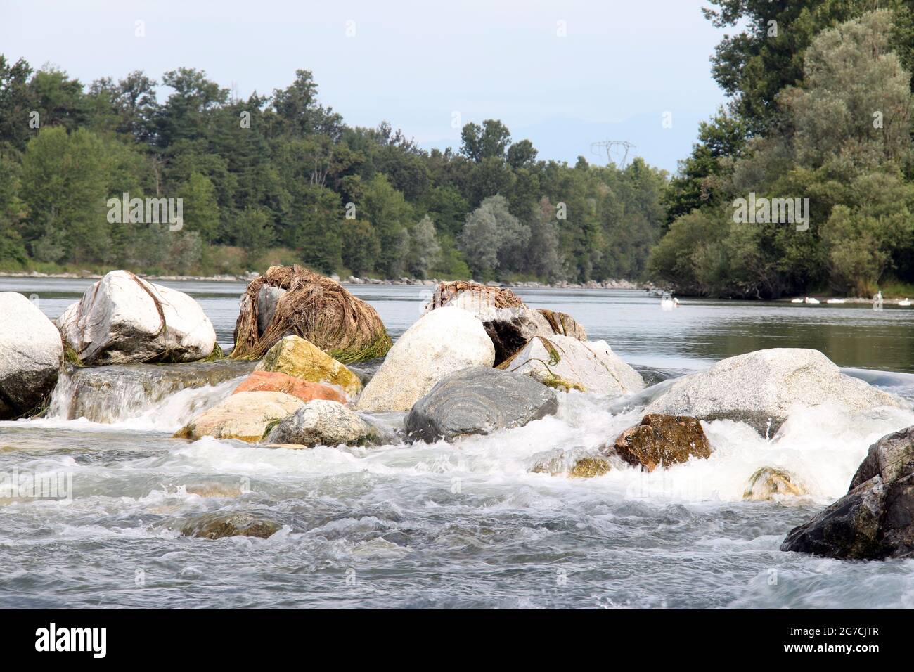 Water Flows between the Stones, Wild Nature of a River between Large Stones Stock Photo