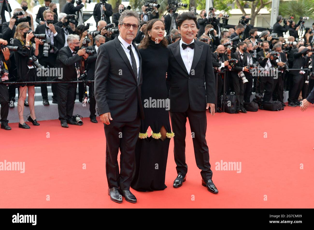 Cannes, France. 12th July, 2021. Jury members Song Kang-ho, Mati Diop and Kleber Mendona Filho attend the screening of the film 'The French Dispatch' during the 74th Annual Cannes Film Festival at Palais des Festivals. Credit: Stefanie Rex/dpa-Zentralbild/dpa/Alamy Live News Stock Photo