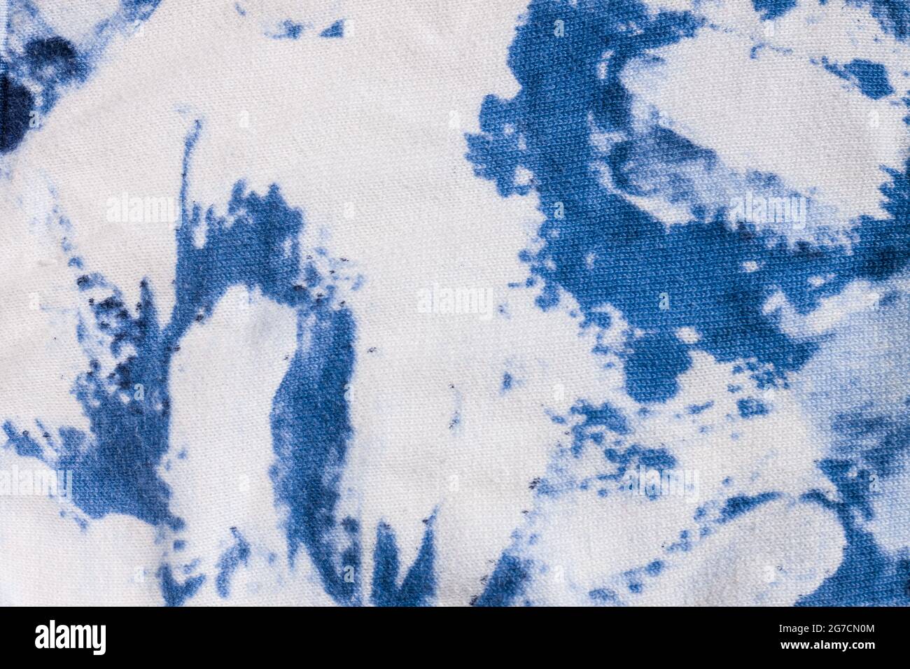 Tiedye cotton fabric texture blue and white paint colors. Ancient