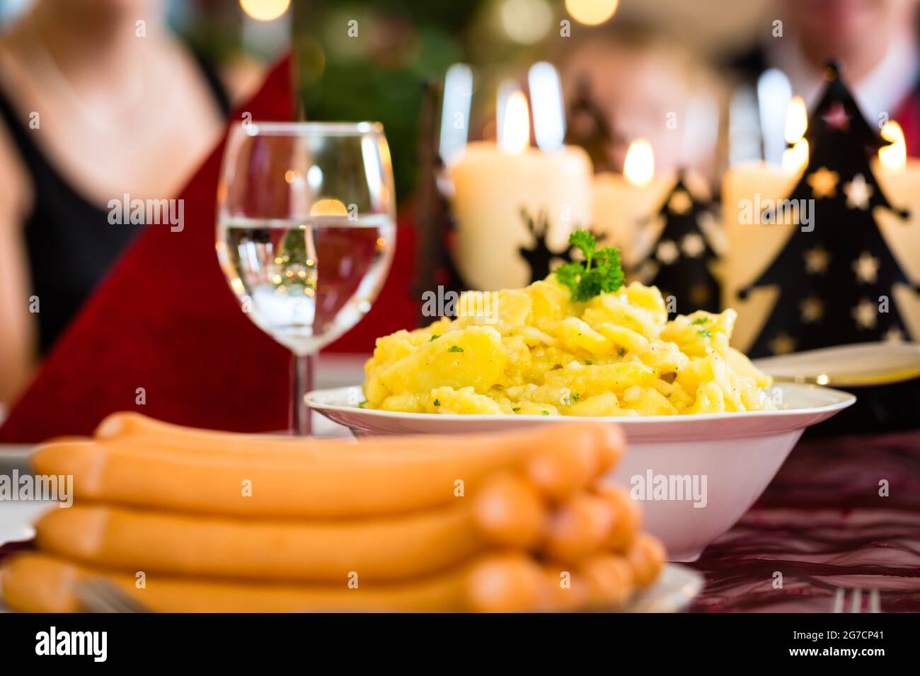 Traditional German Christmas eve dinner Wiener sausages and potato