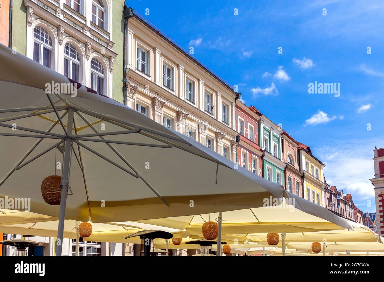 The colorful facades of medieval houses in the market square on a sunny day. Poznan Poland. Stock Photo