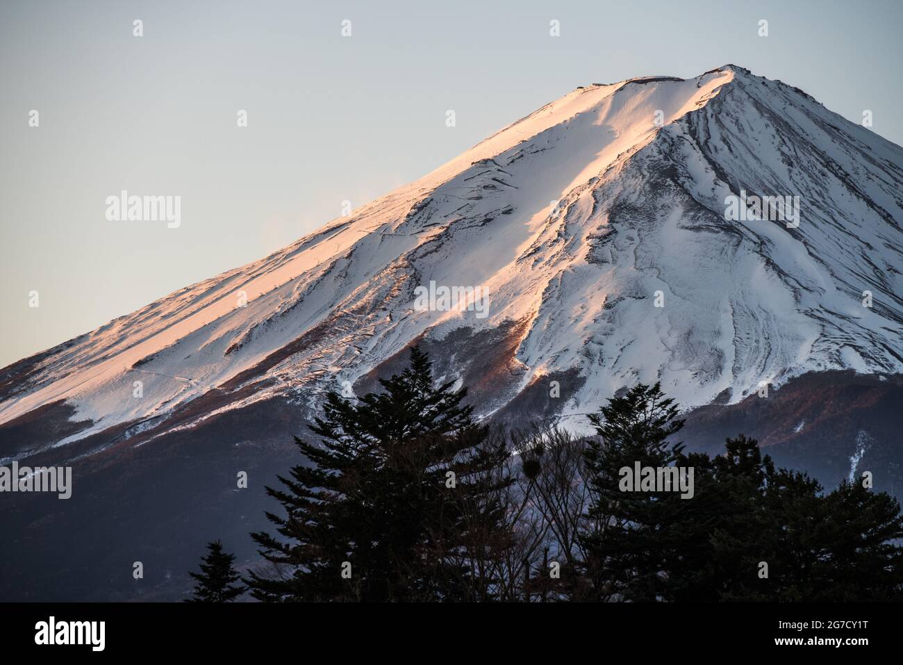 Morning view of Mount Fuji from Kawaguchiko town in Japan. Snow covered peak of Japan