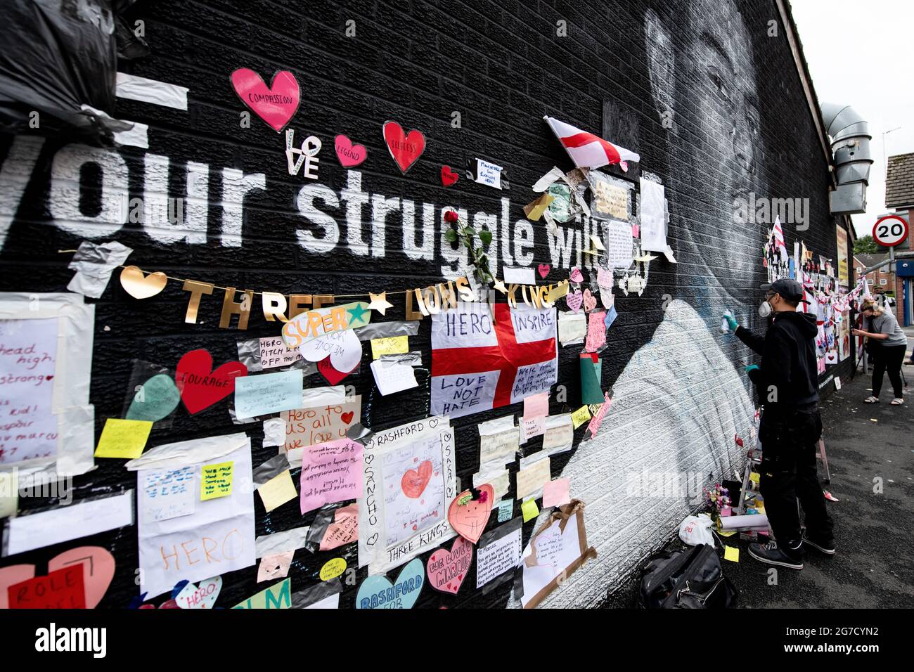 Close up of a small part of the giant Manchester United player Marcus  Rashford mural in Withington, Manchester, England, United Kingdom, that was  vandalised with abusive graffiti after England's Euro2020 football loss