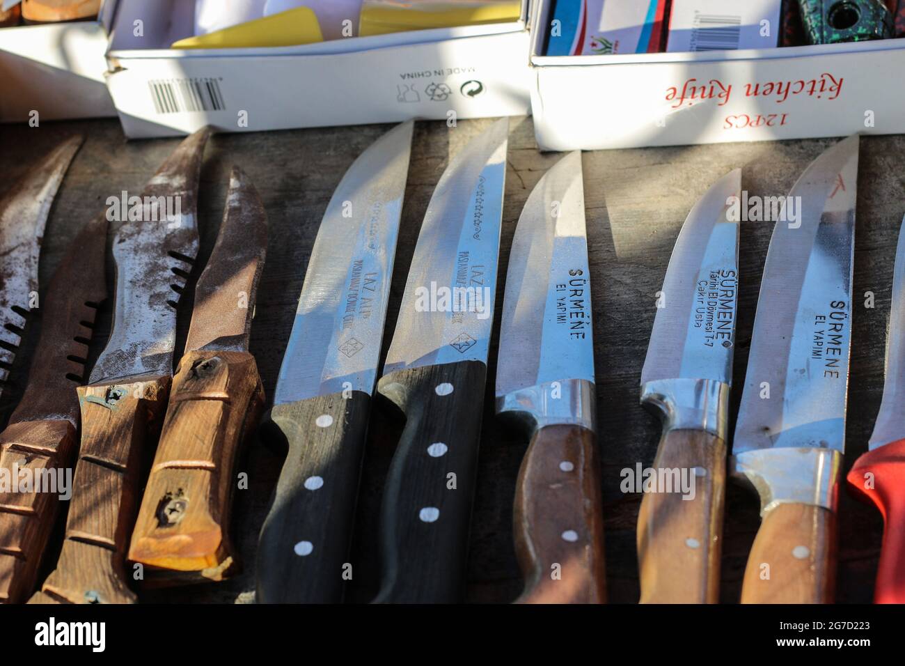 Knives seen on a table at a livestock market in preparation for the upcoming Muslim Eid al-Adha holiday in Dair Al-Balah city south Gaza Strip. (Photo by Ahmed Zakot / SOPA Images/Sipa USA) Stock Photo
