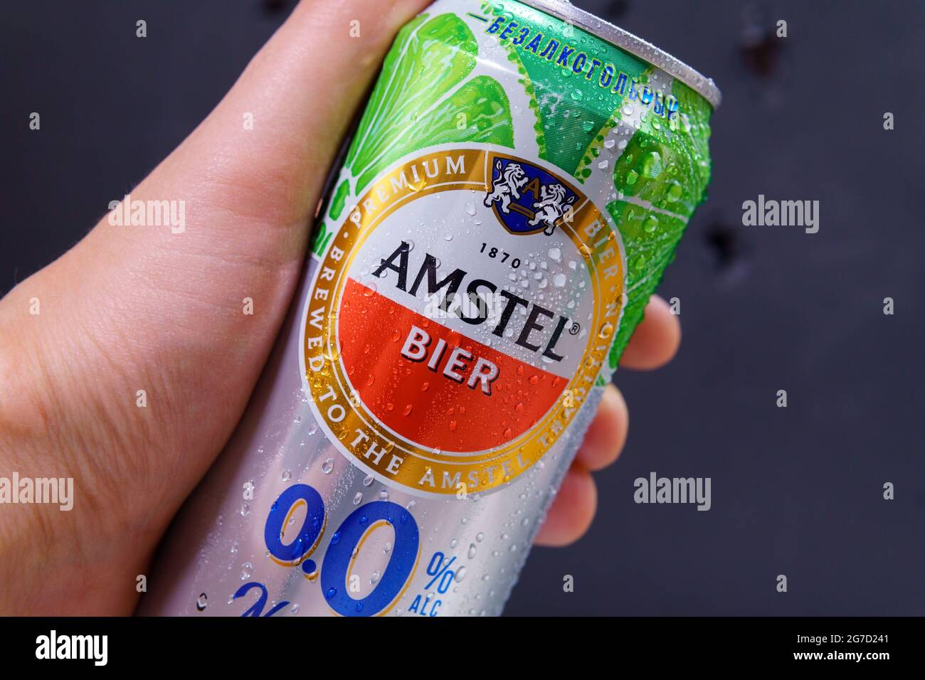 Tyumen, Russia-May 25, 2021: Amstel beer can non-alcoholic with lime and mint. Dark background Stock Photo