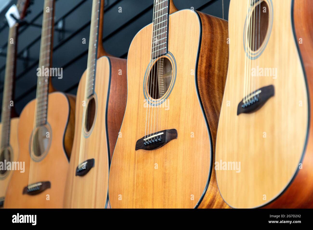 Guitars for sale at Music & Beans Coffee Shop and guitar shop on Green Lanes, Harringay, London, UK Stock Photo
