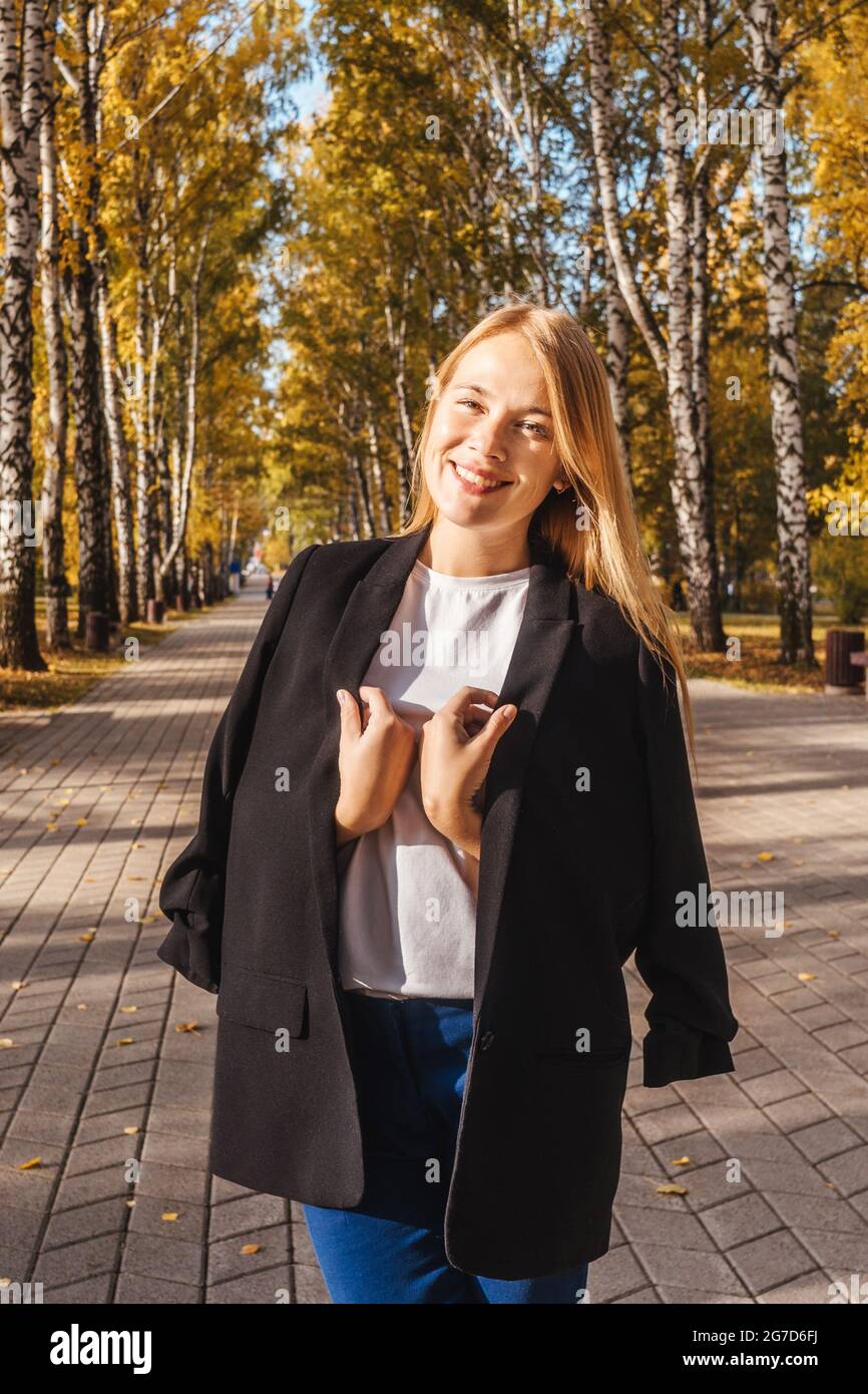 Businesswoman in black blazer hi-res stock photography and images - Alamy