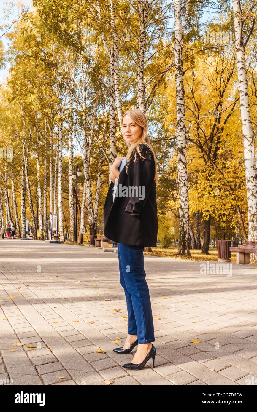 Businesswoman in black blazer hi-res stock photography and images - Alamy