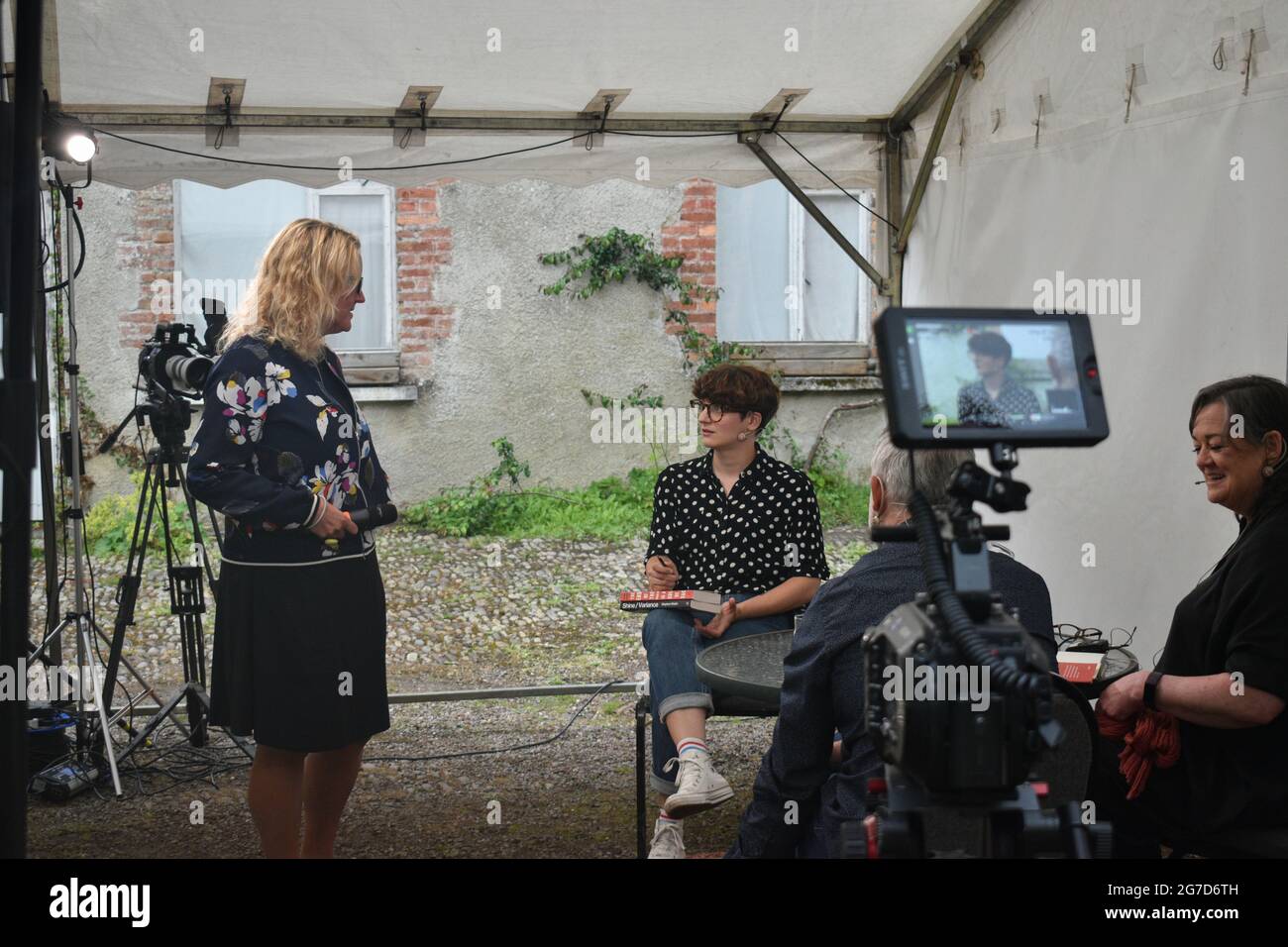 Bantry, West Cork, Ireland. 12th July 2021. West Cork Literary Festival last day of live outdoor events featuring numerous writers. Pictured below Sasha de Buyl with festival director. Credit: Karlis Dzjamko/Alamy Live News Stock Photo