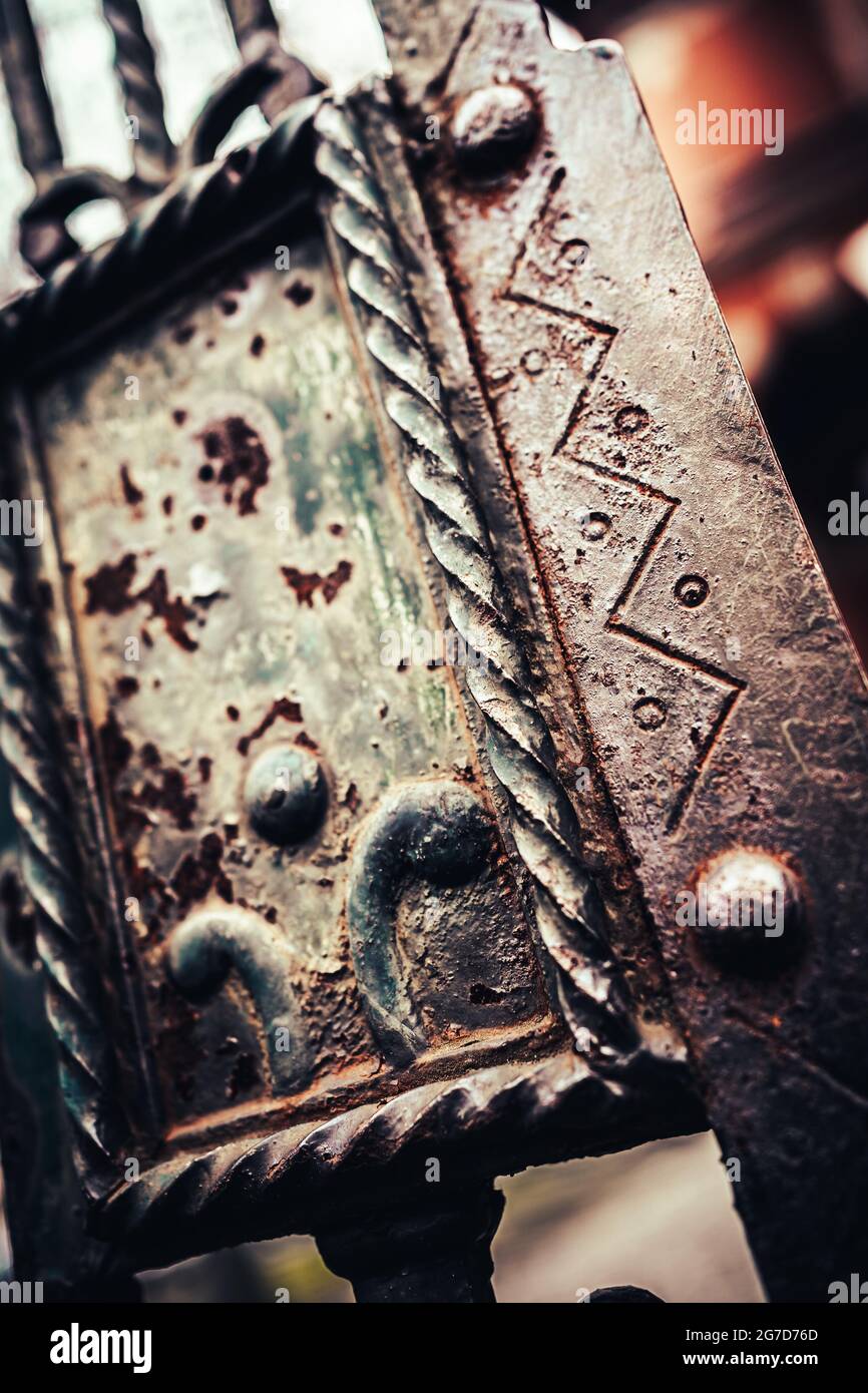 Closeup of an old rusty wrought iron gate Stock Photo - Alamy