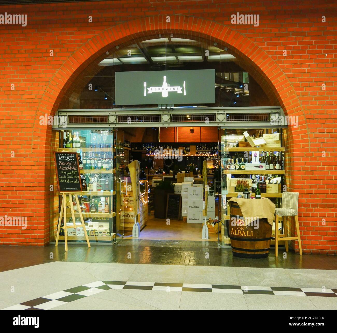 POZNAN, POLAND - Jun 12, 2013: The front entrance of a wine store in the Stary Browar shopping mall Stock Photo