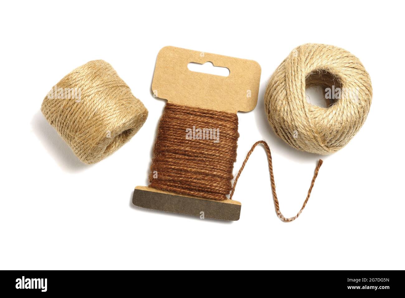 Rolls of Jute twine Rope on White Background Stock Photo
