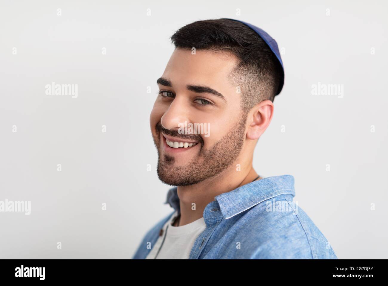 Closeup headshot portrait of smiling jewish man in kippa Stock Photo