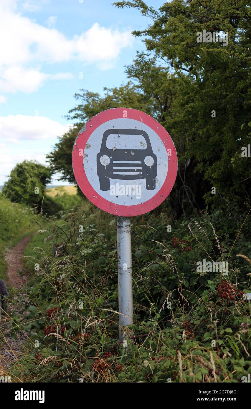A vehicles prohibited sign by a country lane Stock Photo
