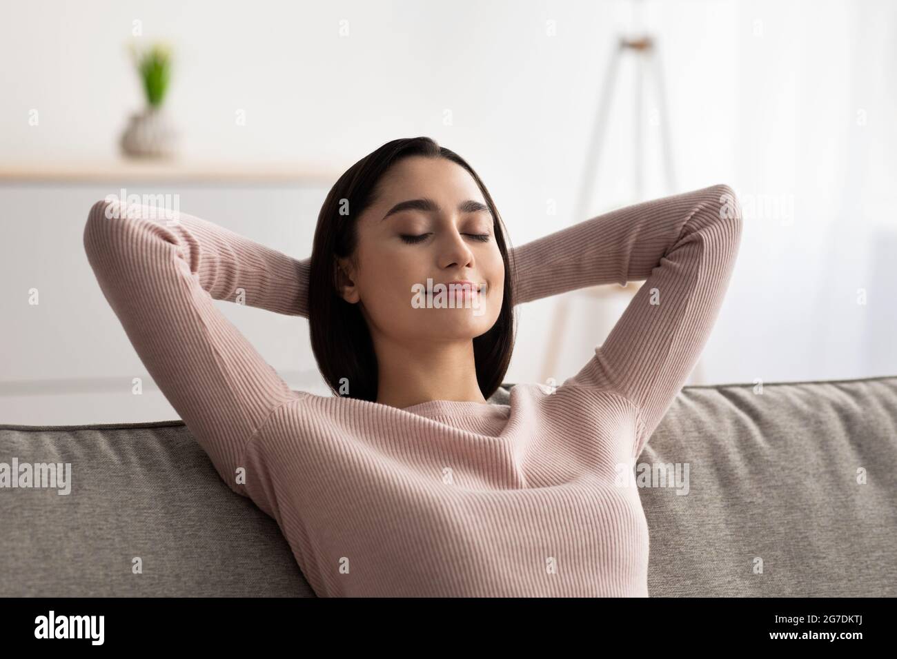 Rest and relax in your own home, enjoy break, positive human emotions Stock Photo