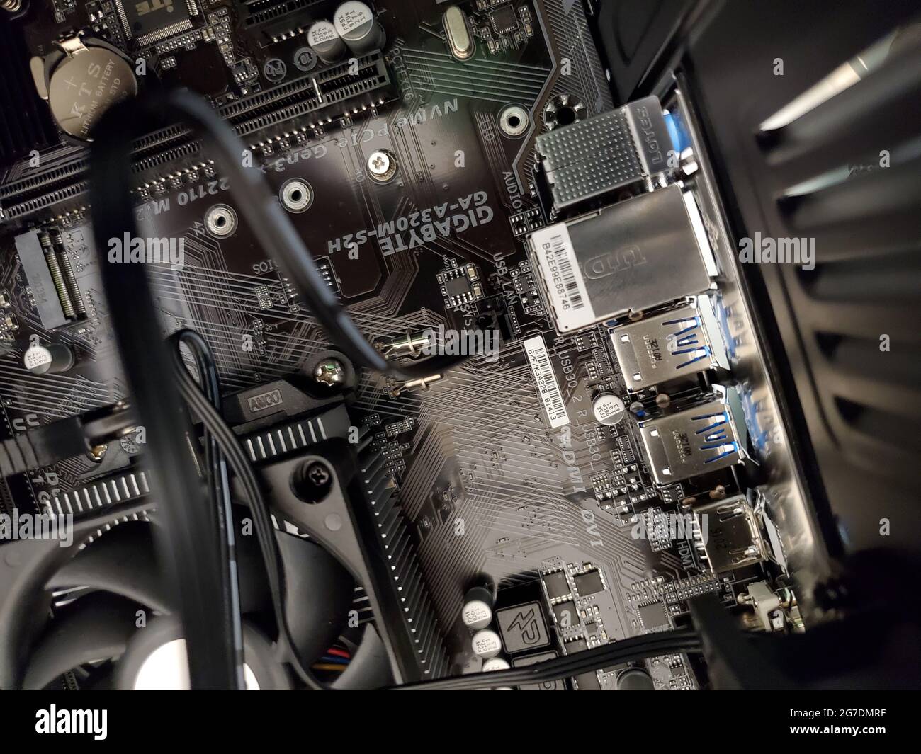 High-angle view of the inside of a desktop PC case with a Gigabyte motherboard visible in Lafayette, California, March 16, 2021. () Stock Photo