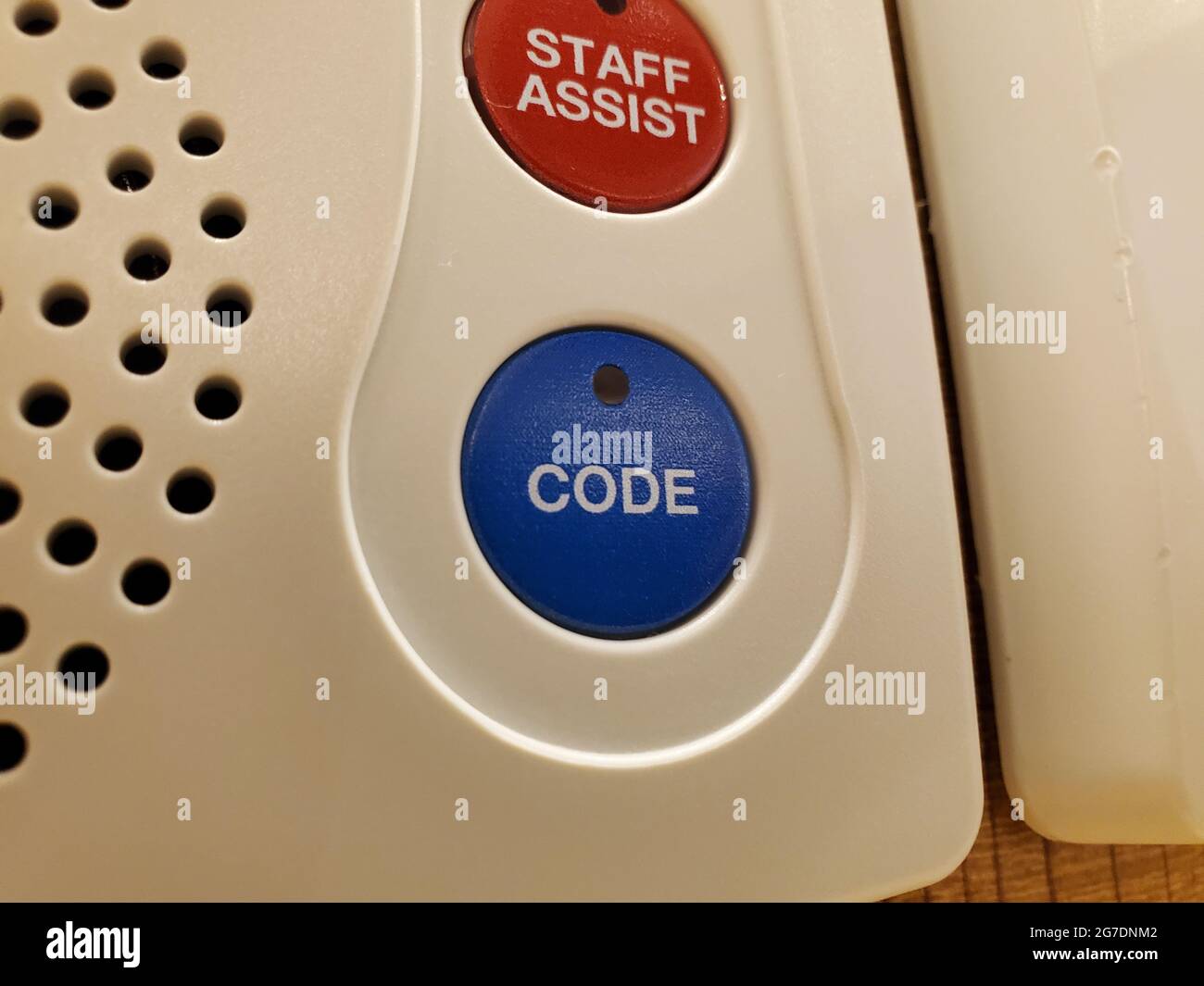 Close-up shot of 'Code' and 'Staff Assist' buttons on a nurse call system in a medical setting in San Francisco, California, April 18, 2021. () Stock Photo
