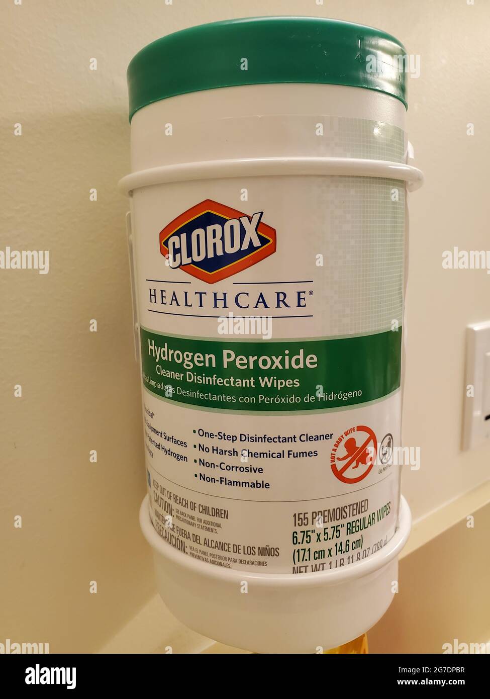 Close-up of a wall-mounted dispenser, labeled 'Clorox Healthcare Hydrogen Peroxide Cleaner Disinfectant Wipes' in a medical setting in San Francisco, California, April 18, 2021. () Stock Photo