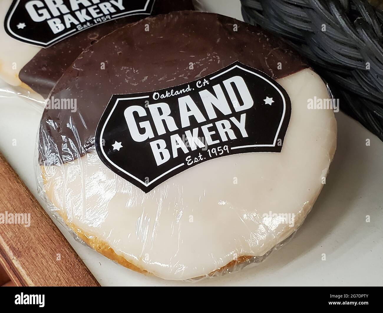 Close-up shot of a Grand Bakery black and white cake cookie coated with half chocolate, half icing, in Lafayette, California, April 26, 2021. () Stock Photo