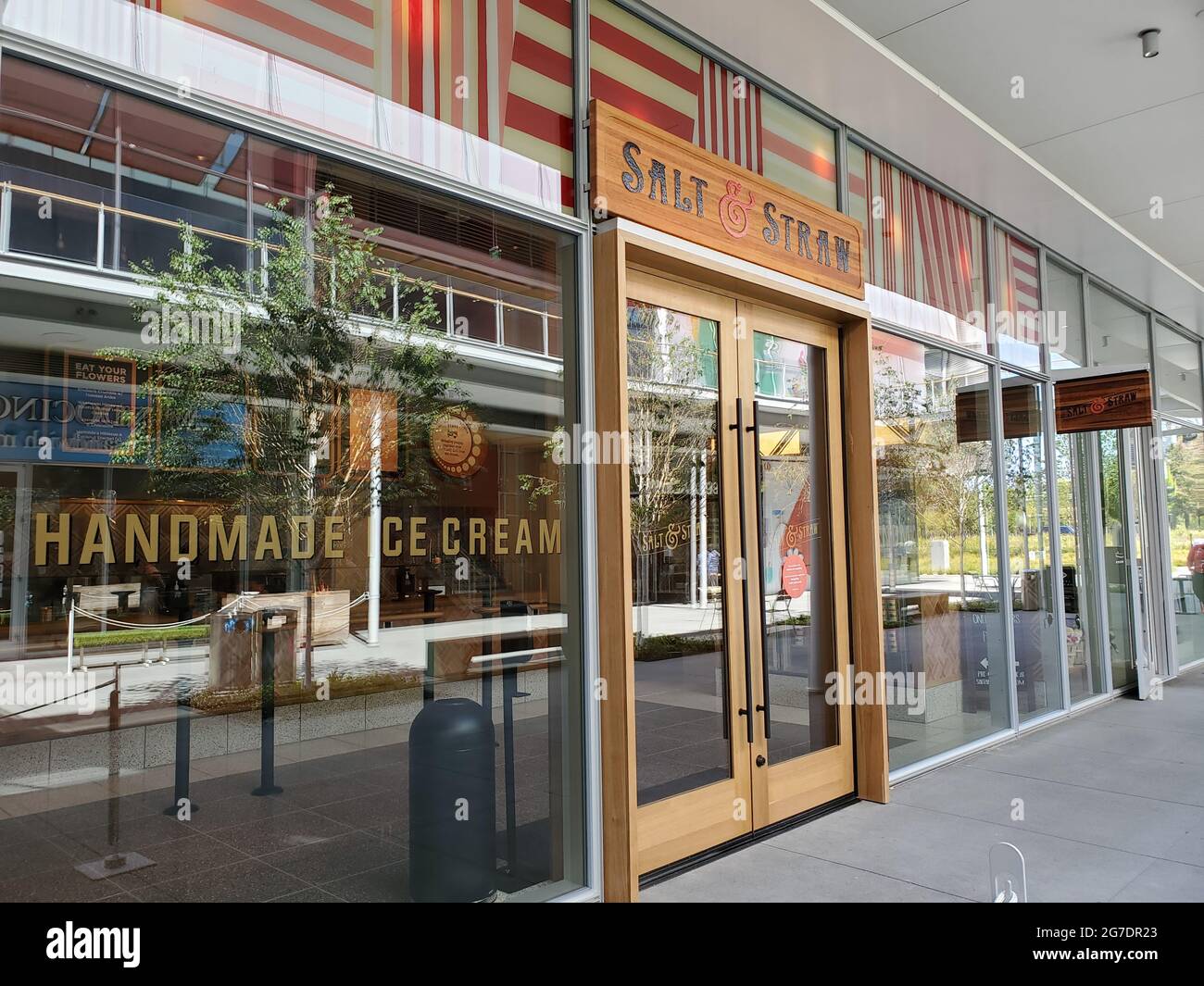 Side view of the entrance to the Salt and Straw ice cream shop at the
