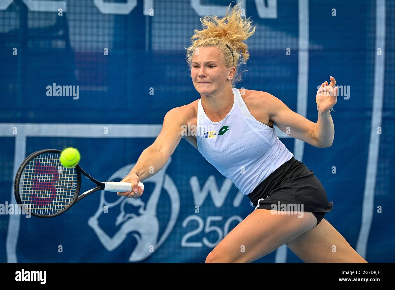 Prague, Czech Republic. 13th July, 2021. Katerina Siniakova (CZE) plays a  return to Jodie Burrage (GBR) during the Livesport Prague Open WTA women's  tennis tournament in Prague, Czech Republic, July 13, 2021.