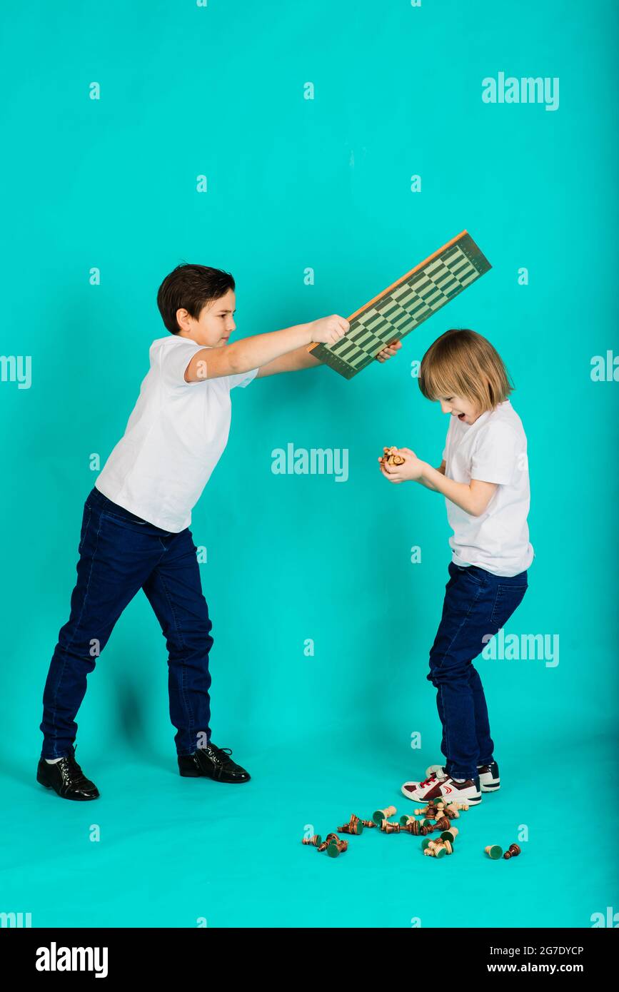 Two boys play board game hi-res stock photography and images - Alamy