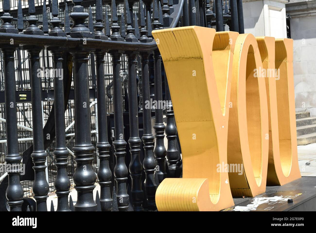 A large temporary yellow You sign outside of St Pauls London in July 2021 Stock Photo