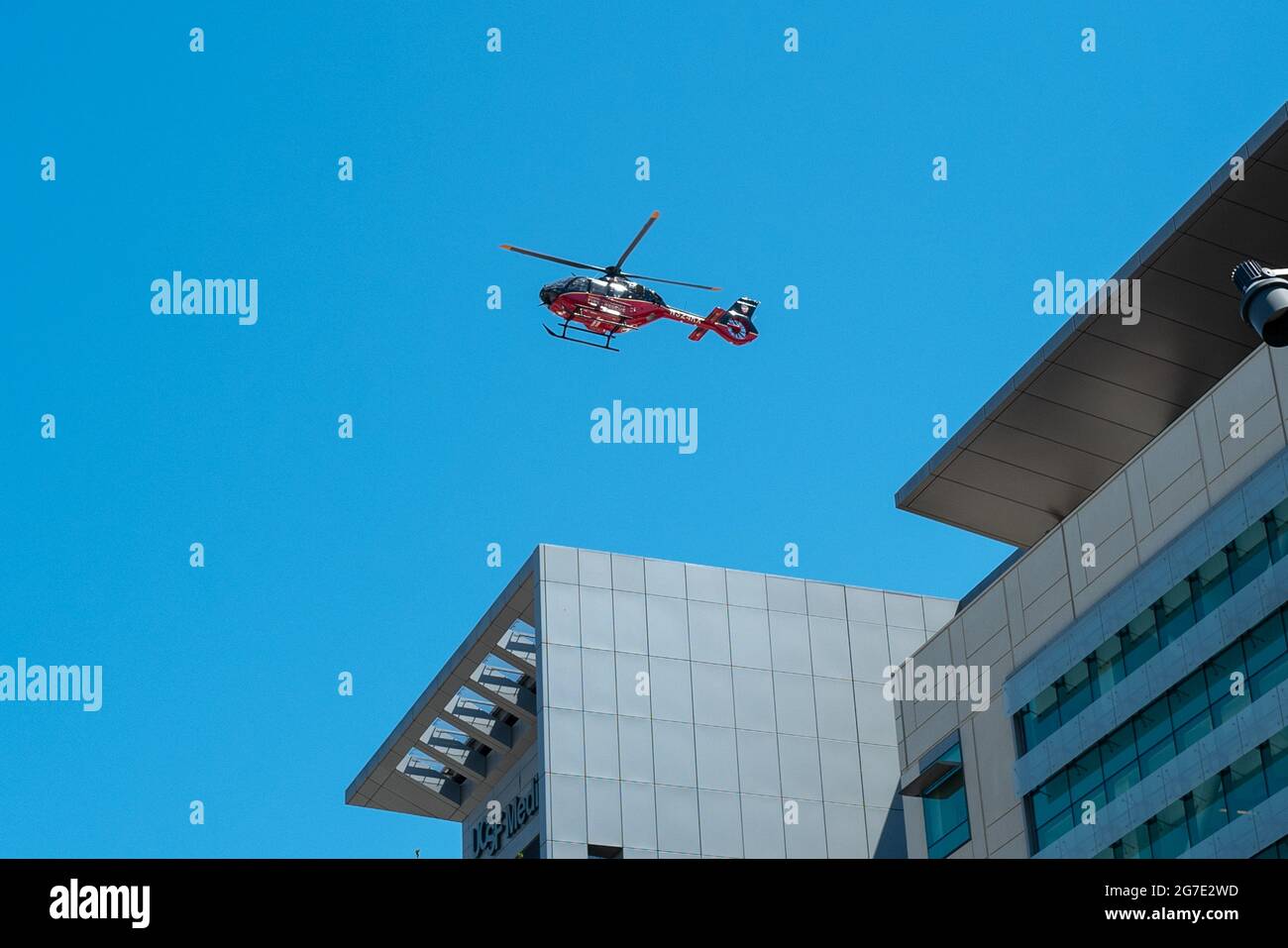 An emergency medical transport helicopter lands atop University of California San Francisco hospital in Mission Bay, San Francisco, California, June 3, 2021. () Stock Photo