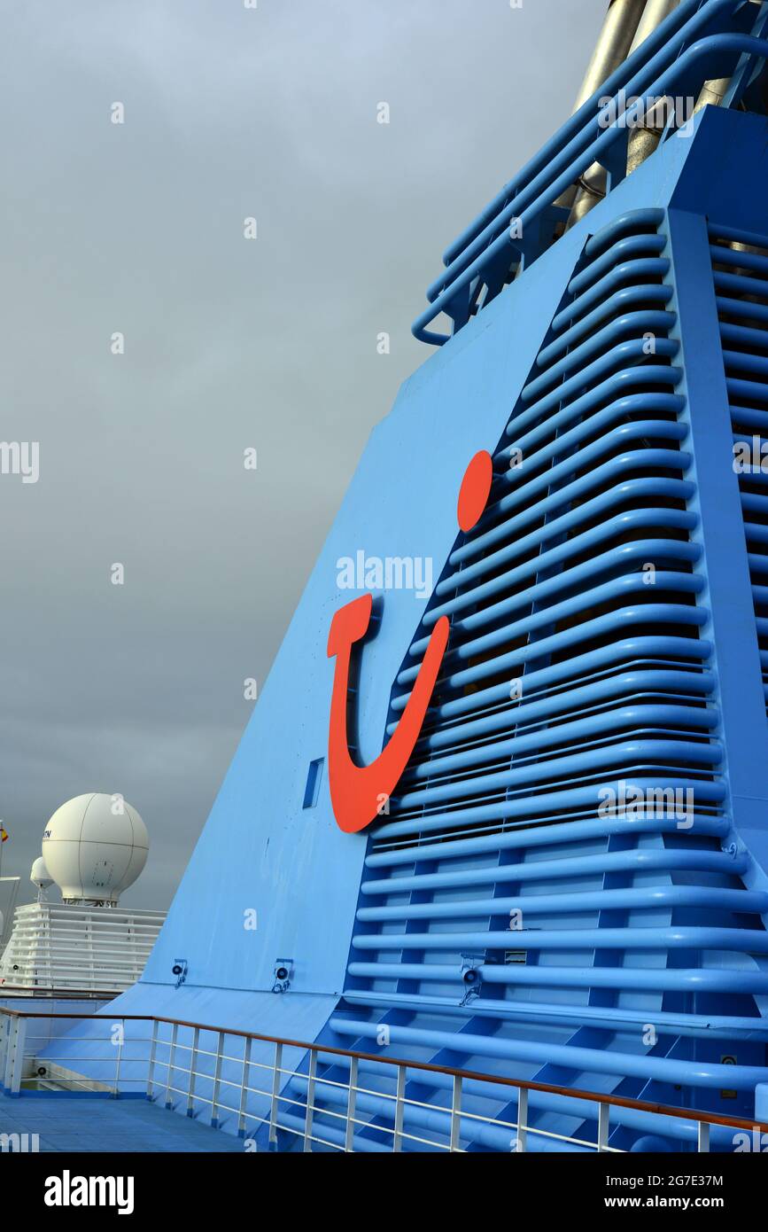 TUI logo on the funnel of the Thomson Majesty cruise ship in the Canary Islands near Lanzarote. Stock Photo