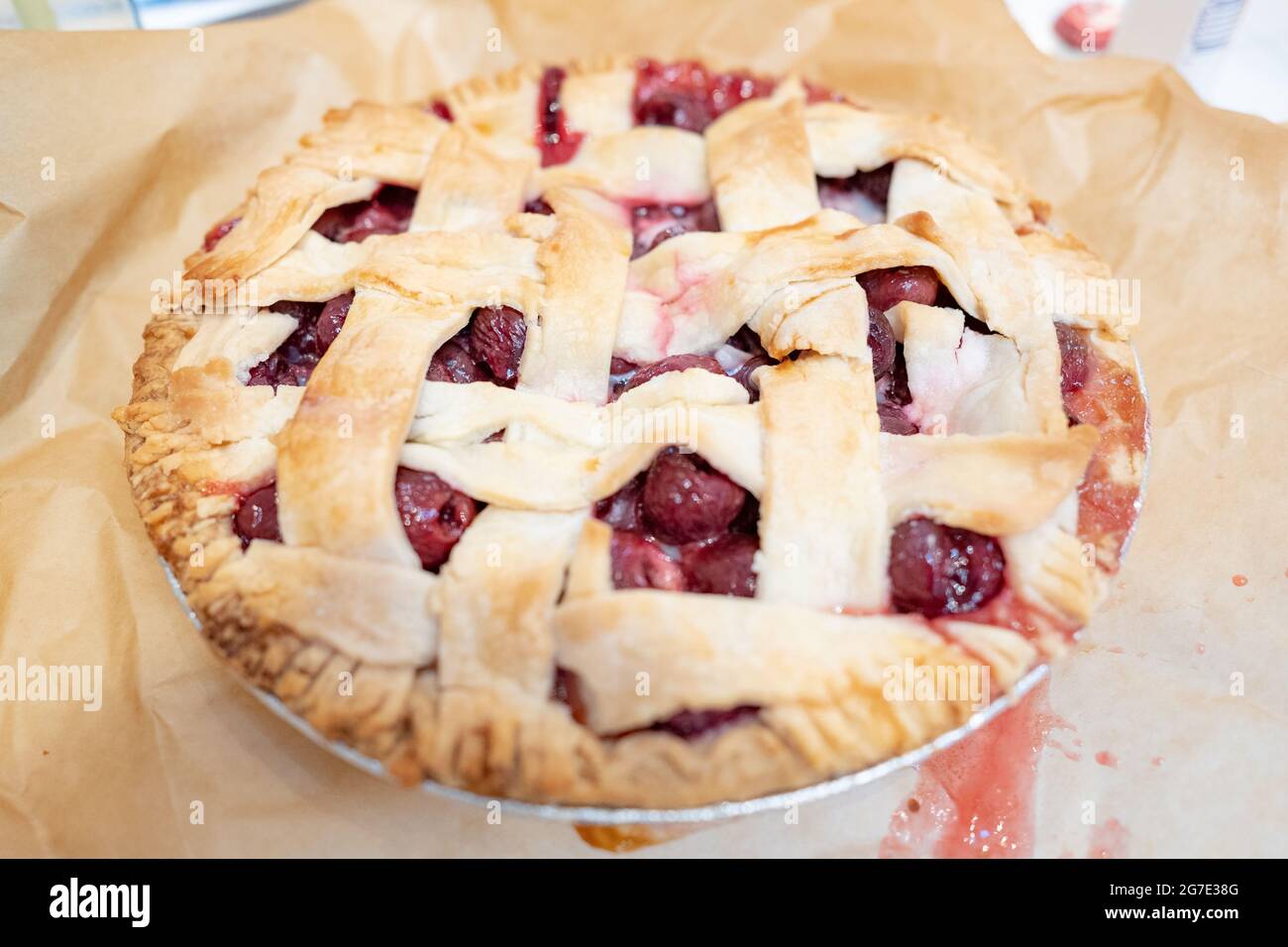Finished pie cooling during baking of a homemade cherry pie, Lafayette, California, June 17, 2021. () Stock Photo