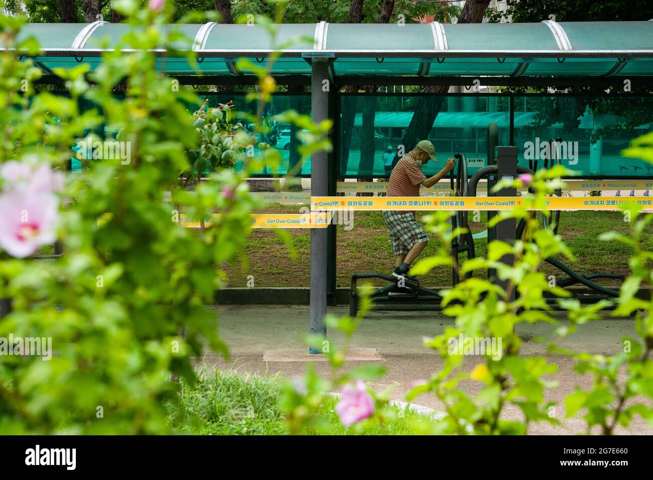 July 13, 2021, Bucheon, Bucheon, South Korea: A man exercises in an off-limits area of Yeouido Park in Seoul. (Credit Image: © Jintak Han/ZUMA Wire) Stock Photo