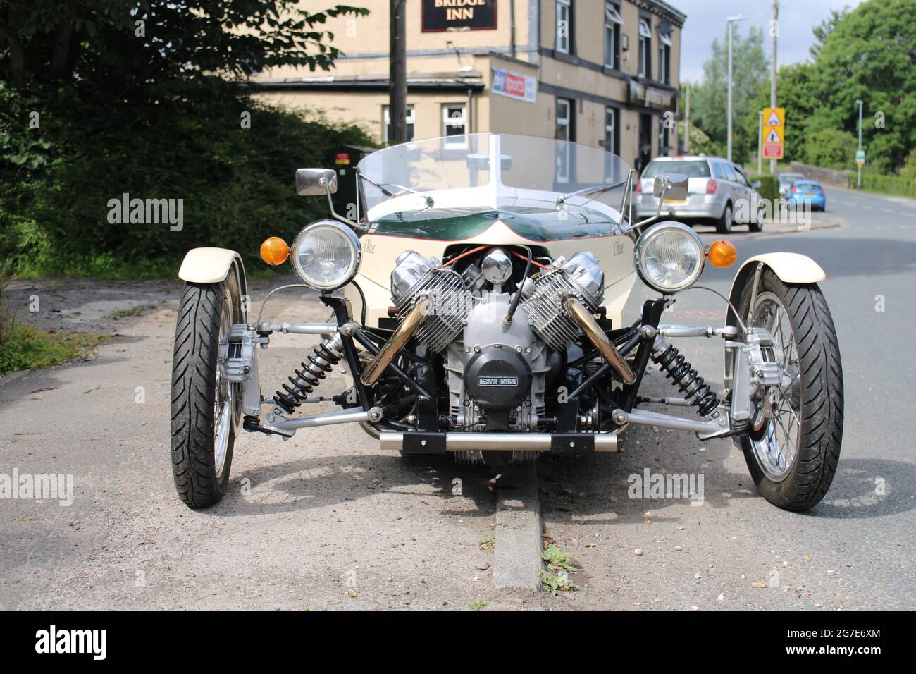 Front view of 3 wheeled Moto Guzzi Triking parked on the roadside