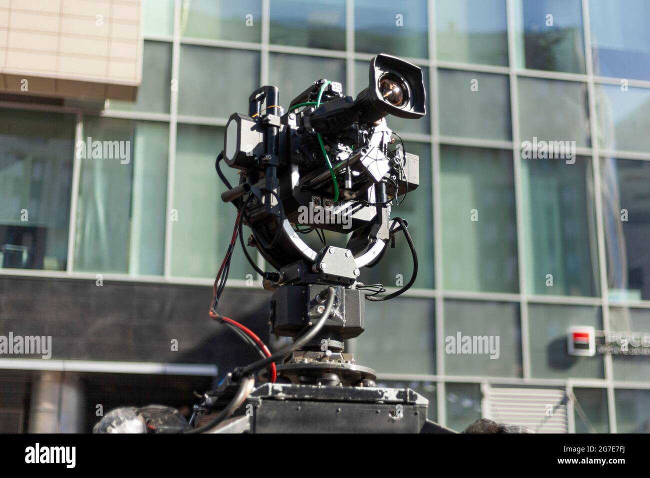 Camcorder on rails. Compressed TV shooting. Professional camera for