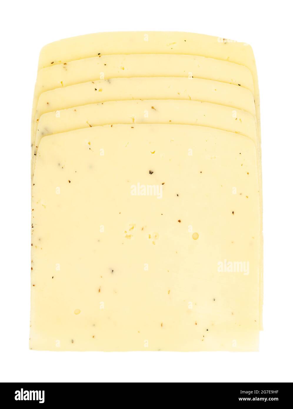 Truffle cheese slices. Stack of sliced cheddar for cheeseburgers, made of pasteurized cow milk, and truffle flakes. Dairy product. Light yellow. Stock Photo