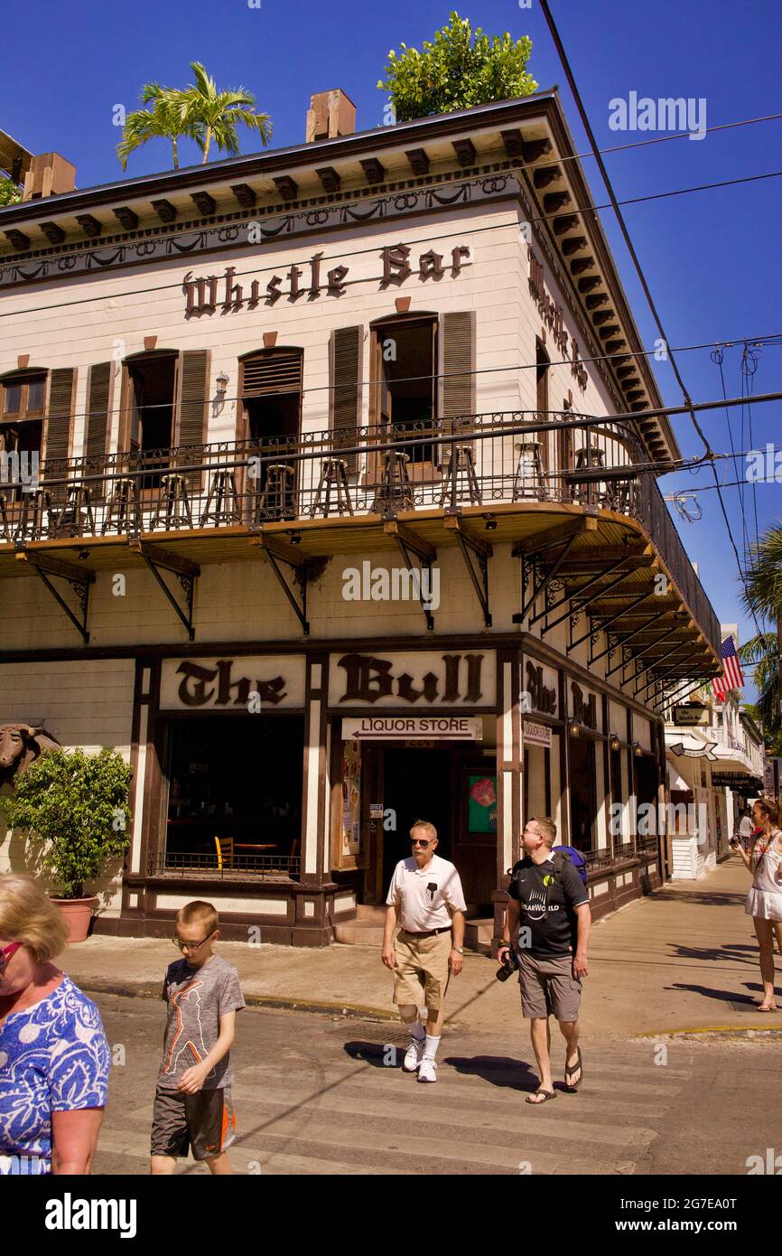The Bull, the Whistle Bar on Duval Street.  Daytime, with blue sky. Stock Photo