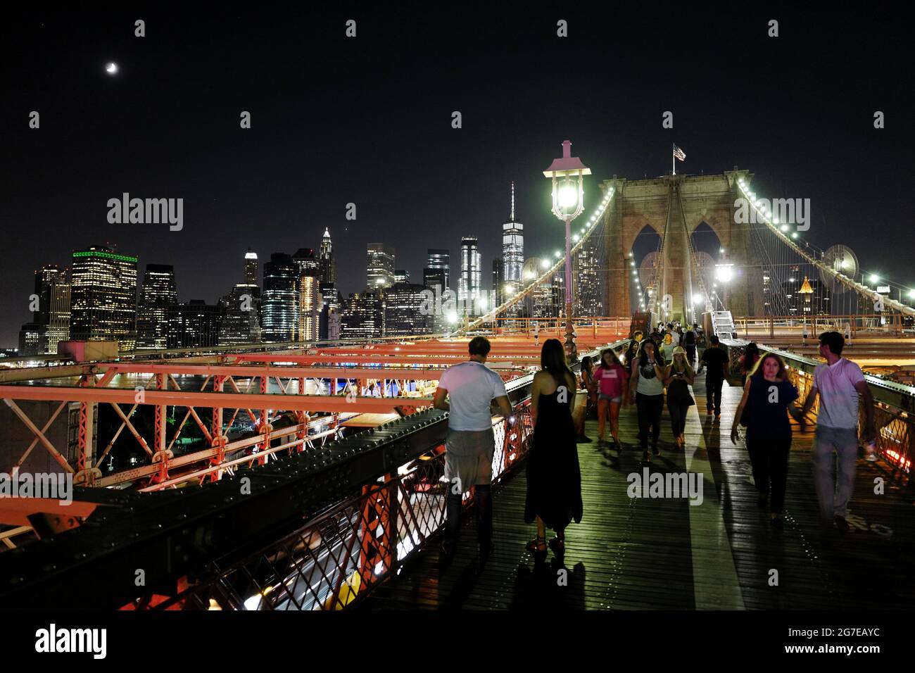 Night view of the Manhattan skyline from the Brooklyn bridge, in New York City. Stock Photo