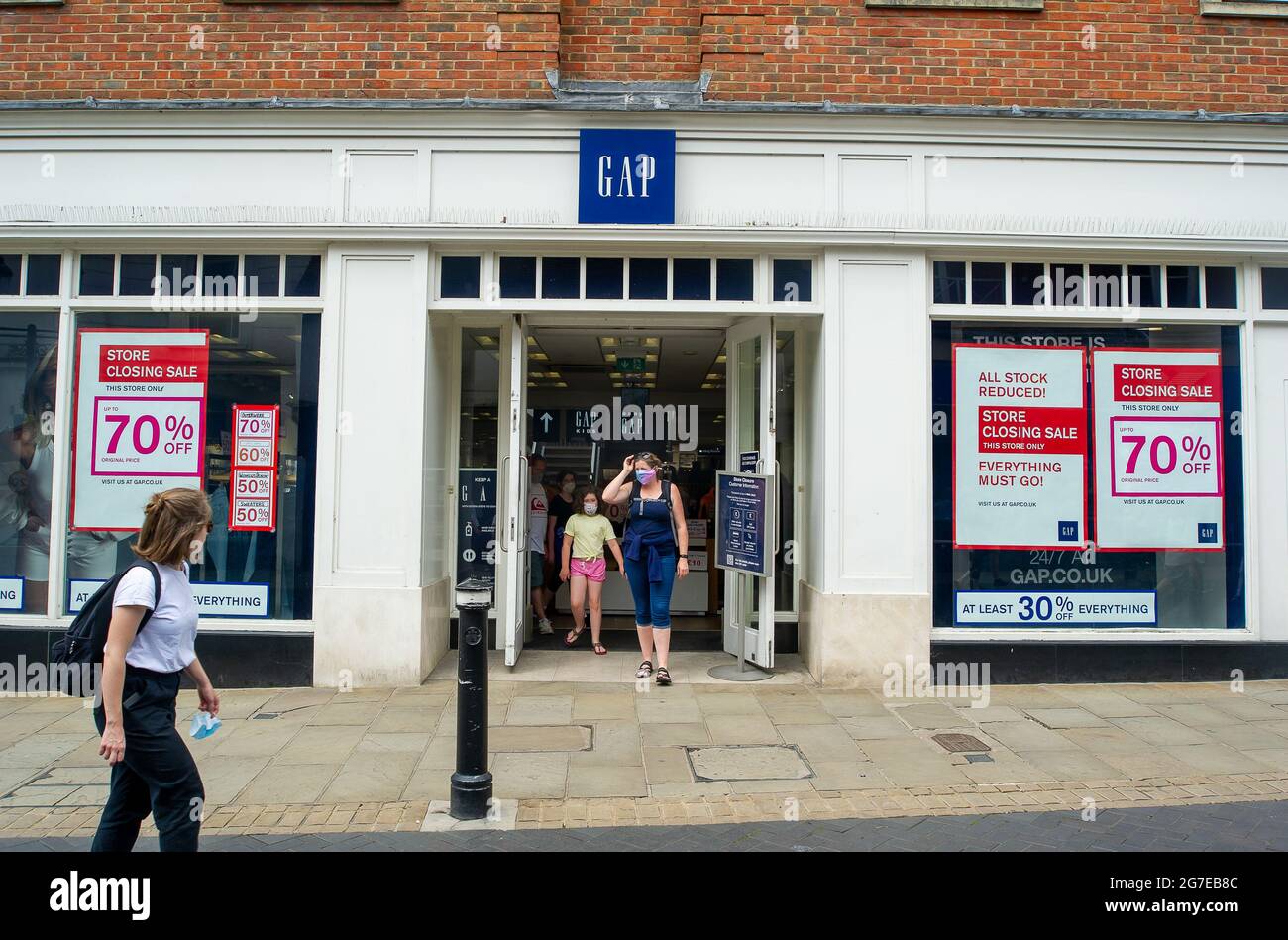 Windsor, Berkshire, UK. 13th July, 2021. The GAP store in Windsor is  closing down are currently holding a sale with up to 70% off. Credit:  Maureen McLean/Alamy Live News Stock Photo - Alamy