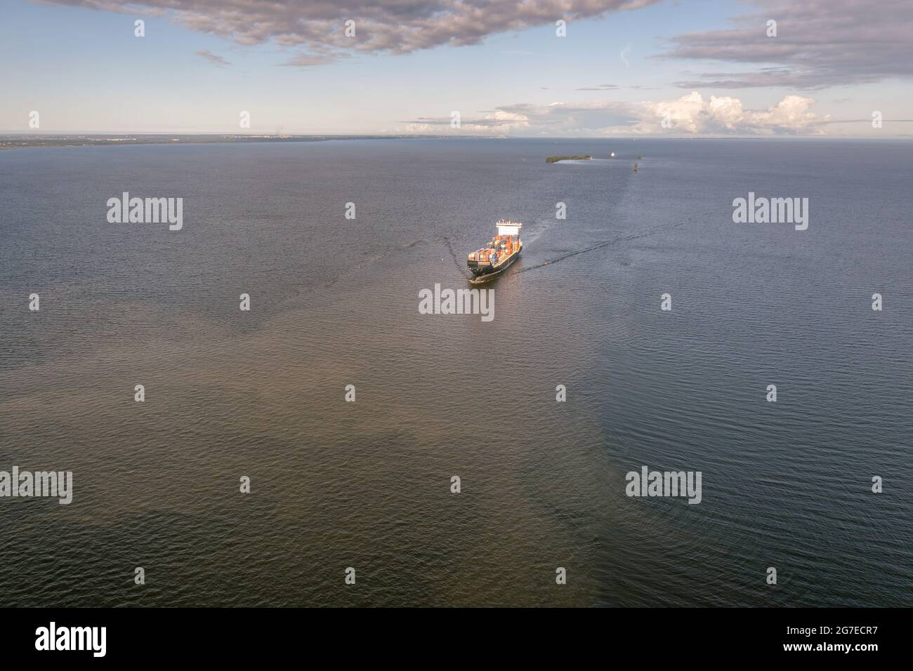 Large loaded container ship sailing high seas. Aerial high angle view, hdr image Stock Photo