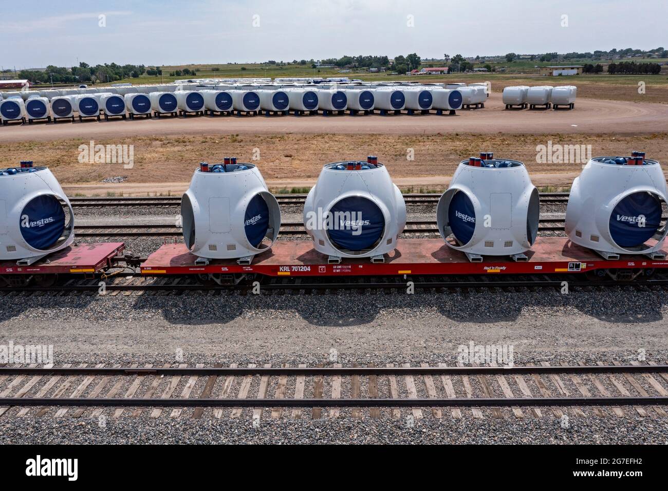 Brighton, Colorado - Wind turbine rotor hubs (on rail cars) and nacelles at the Vestas nacelle factory. Stock Photo