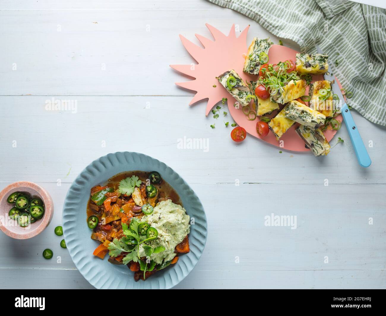 Kidney Bean Chilli & Avo Mash, and Crustless Spinach & Mushroom Quiche Stock Photo Alamy