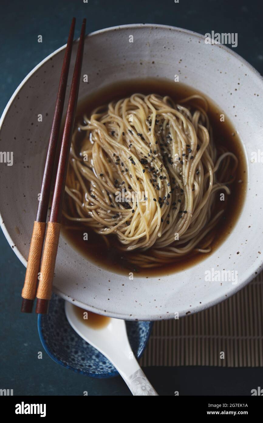 Hot japanese noodles ramen with broth dash or dashi and sesame Stock Photo Alamy